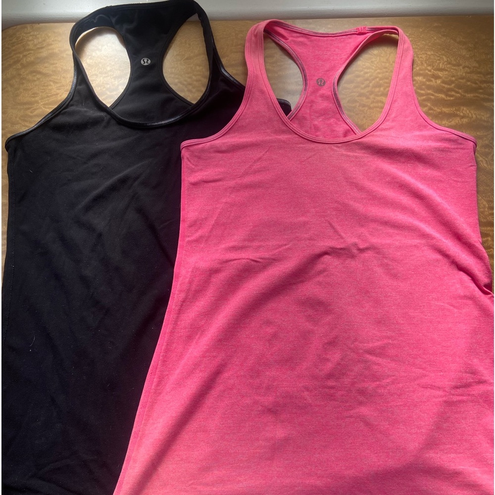 2 Lululemon tank tops: Black, Pink.